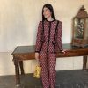 Conjunto traje botones estampado naranja - Imagen 2